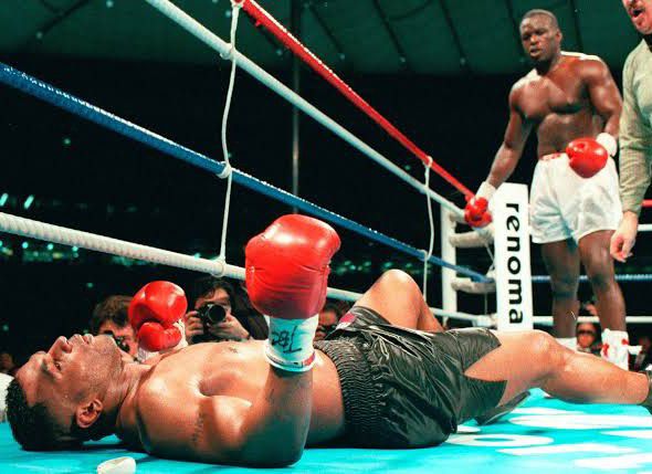 A snapshot of Buster Douglas landing the knockout punch on Mike Tyson.