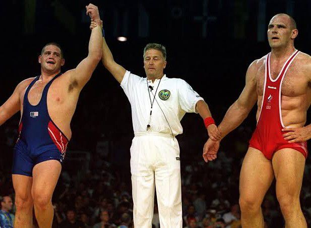 A photo of Rulon Gardner celebrating after his victory over Karelin.